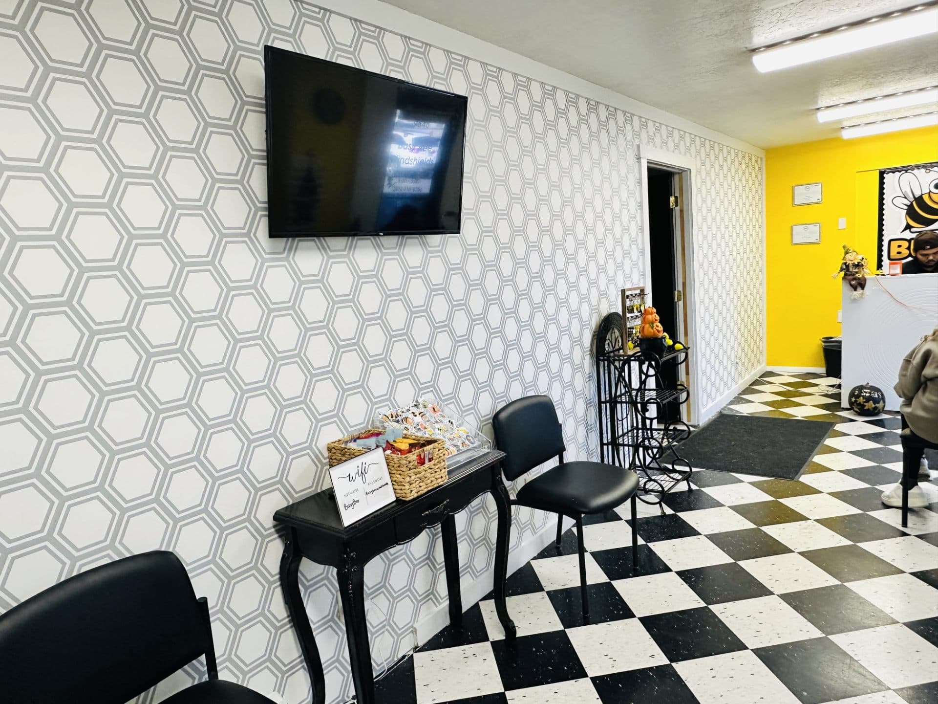 Commercial waiting room with a yellow accent wall